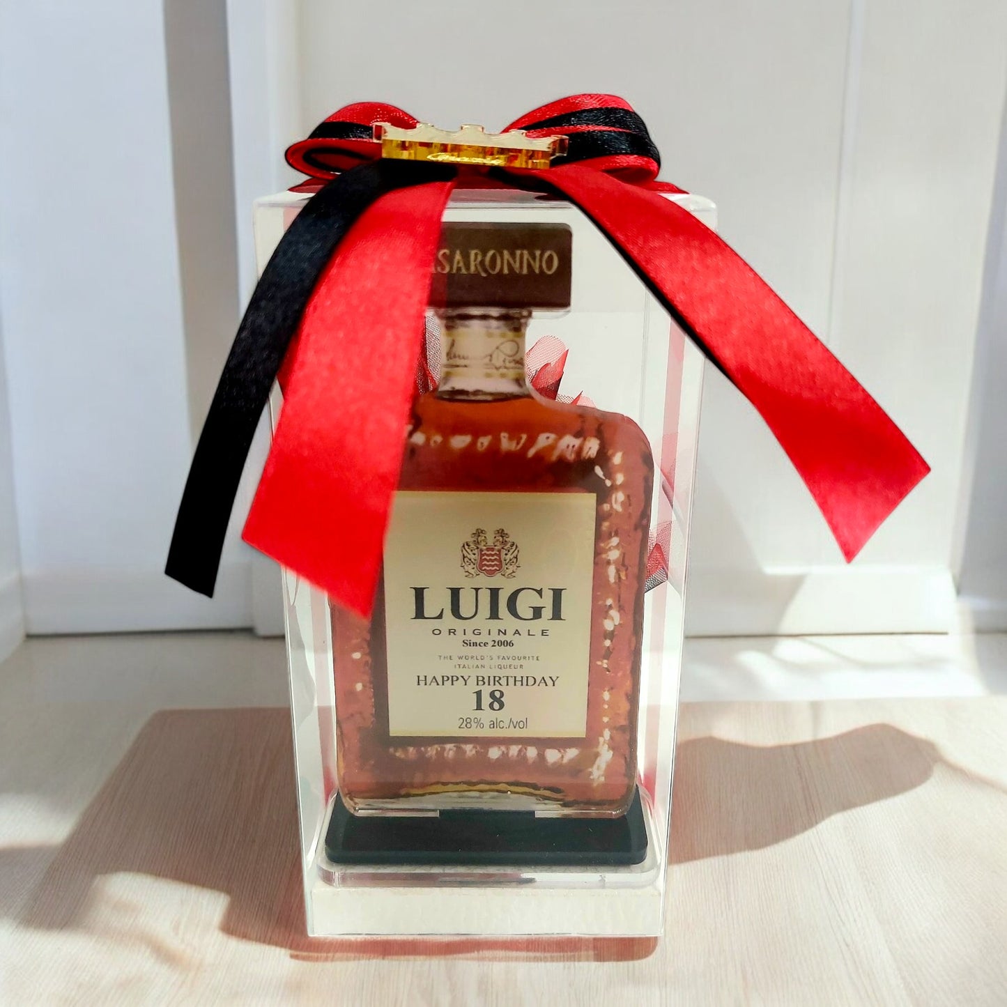 Bomboniera in tema bottiglia di liquore (Disaronno)