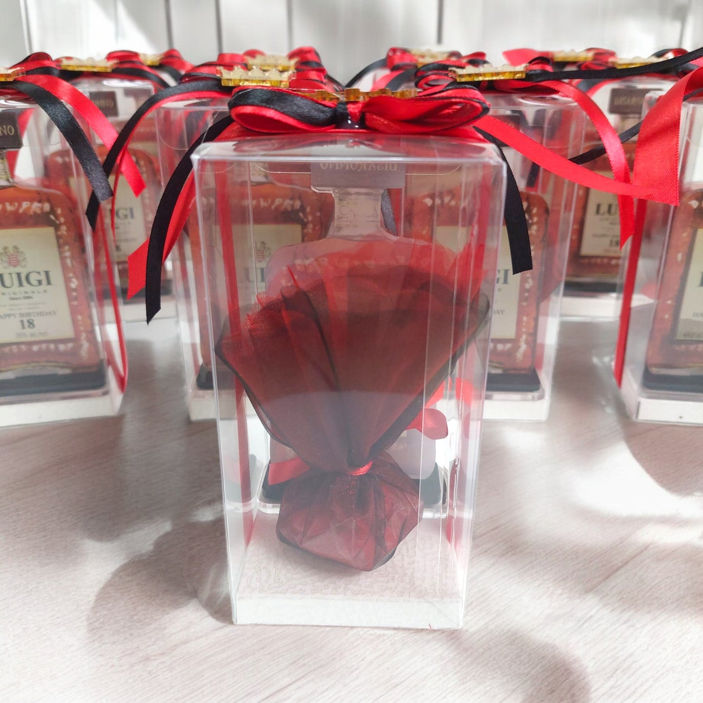 Bomboniera in tema bottiglia di liquore (Disaronno)