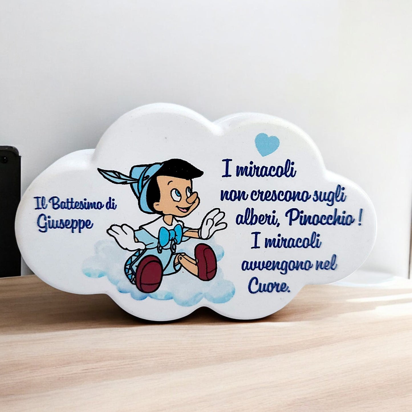 Portafoto in gesso resinato a forma di cuore o nuvola in tema Pinocchio
