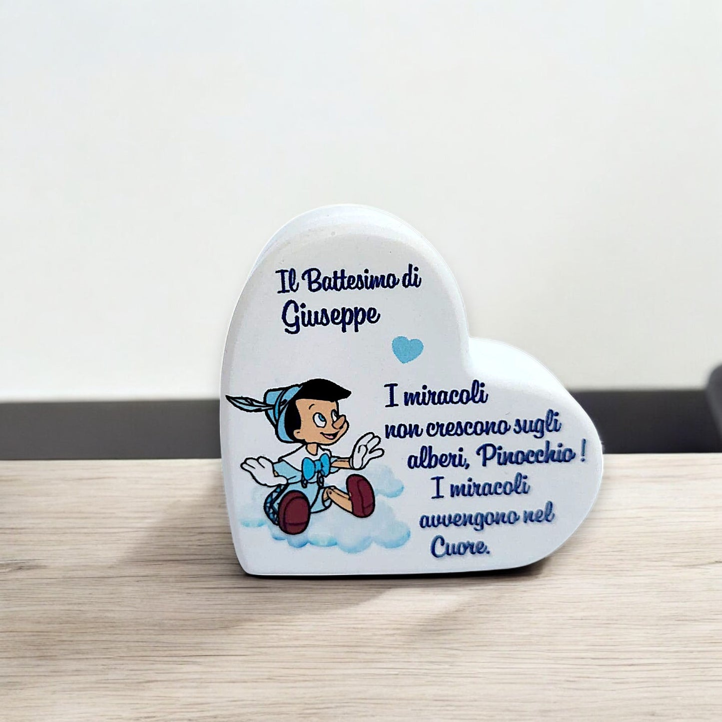 Portafoto in gesso resinato a forma di cuore o nuvola in tema Pinocchio