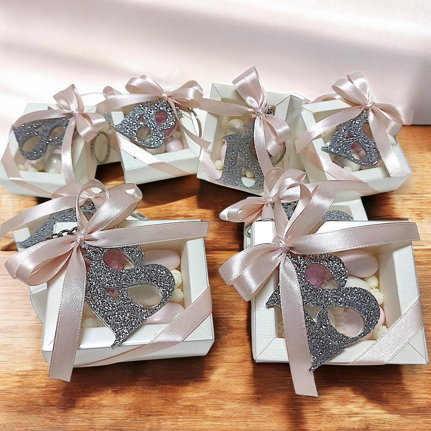 Portachiavi in plexiglass glitterato con scatola degustazione confetti