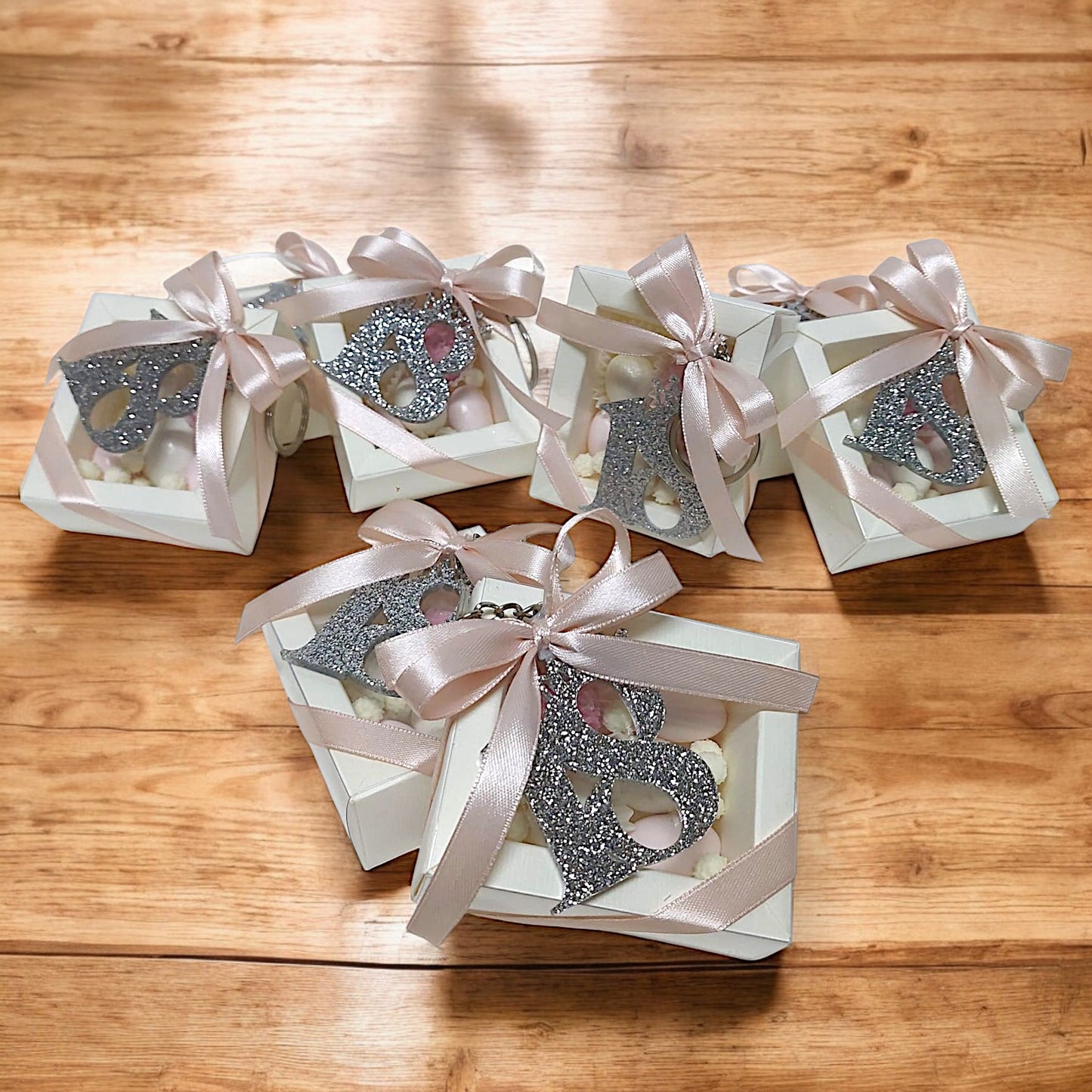 Portachiavi in plexiglass glitterato con scatola degustazione confetti