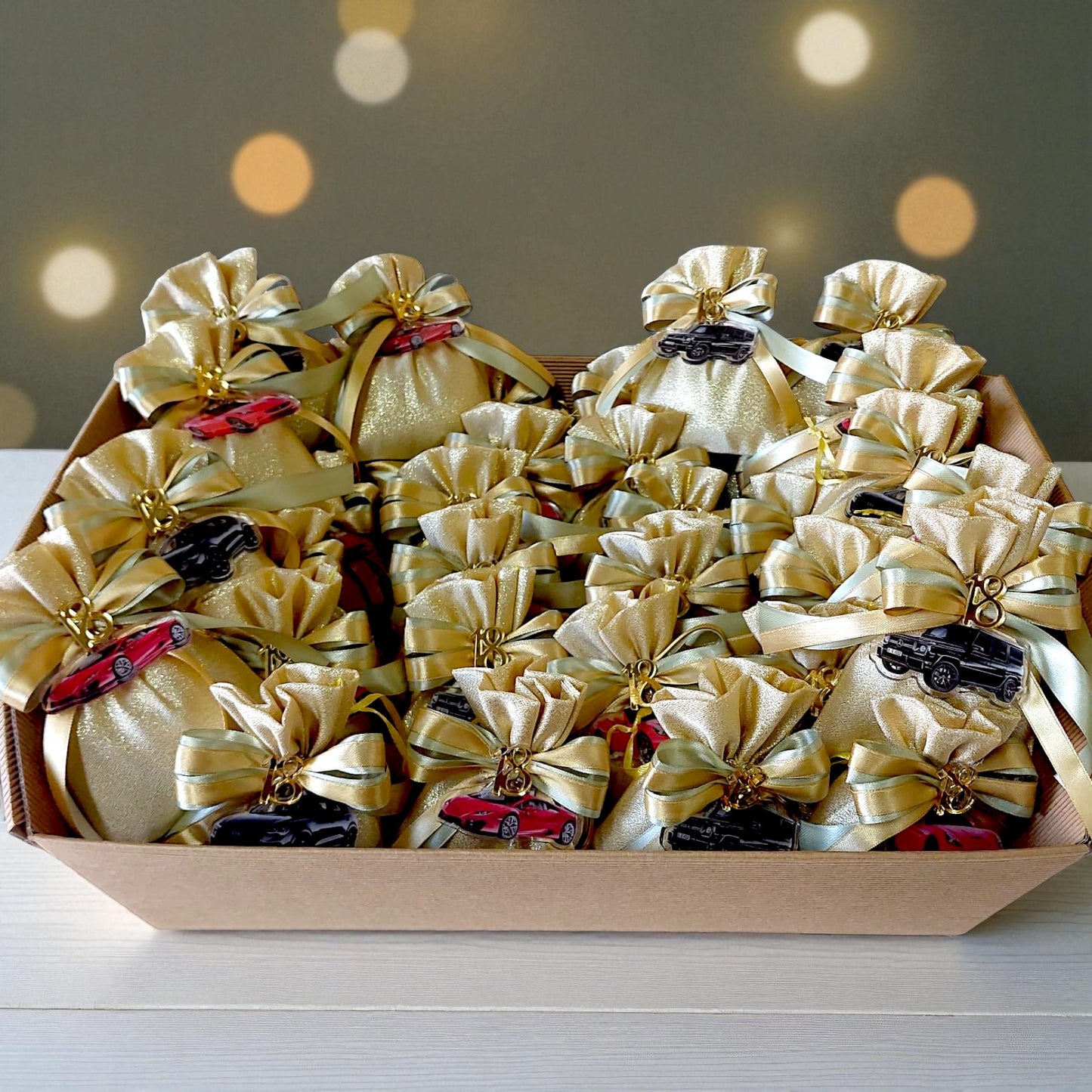 Plexiglass keychains with a chic handbag and sports car theme