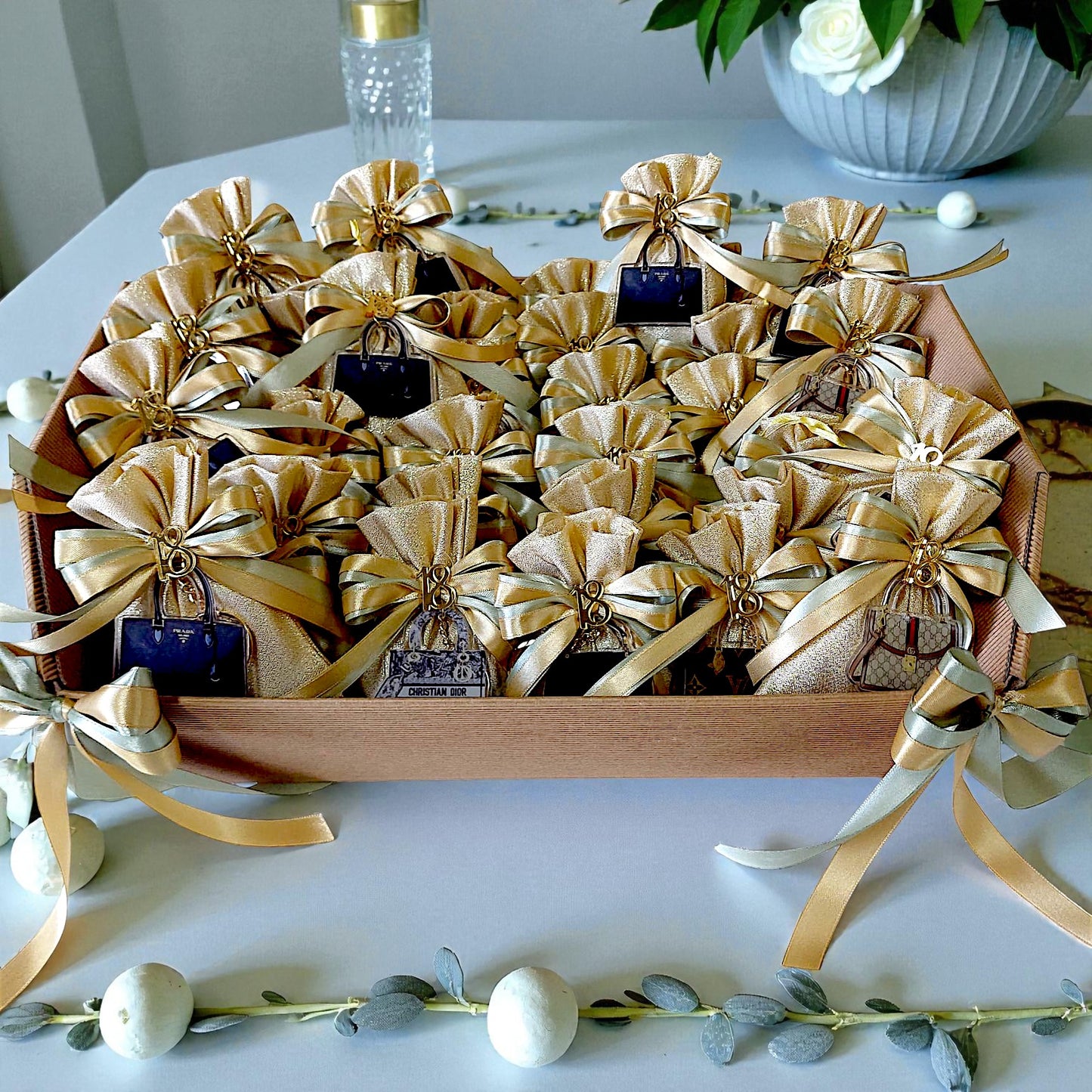 Plexiglass keychains with a chic handbag and sports car theme