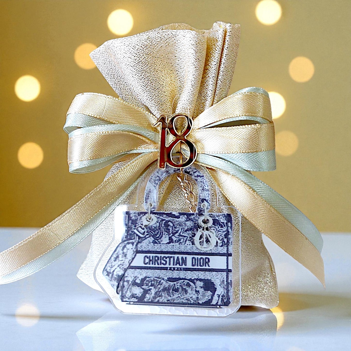 Plexiglass keychains with a chic handbag and sports car theme