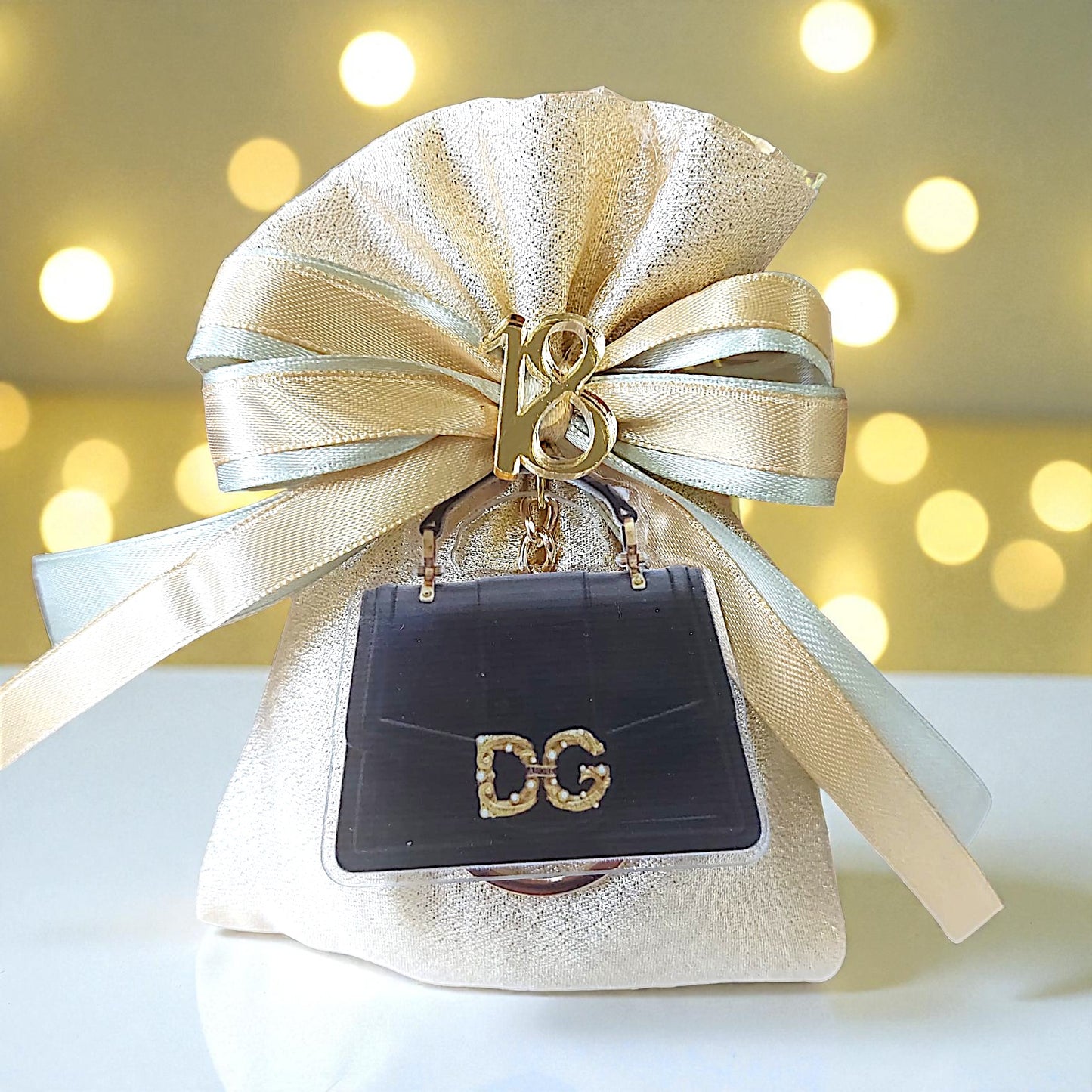 Plexiglass keychains with a chic handbag and sports car theme