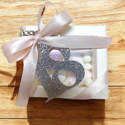 Portachiavi in plexiglass glitterato con scatola degustazione confetti