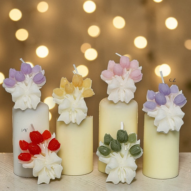 Cerchio metallico con candela a forma di fiore