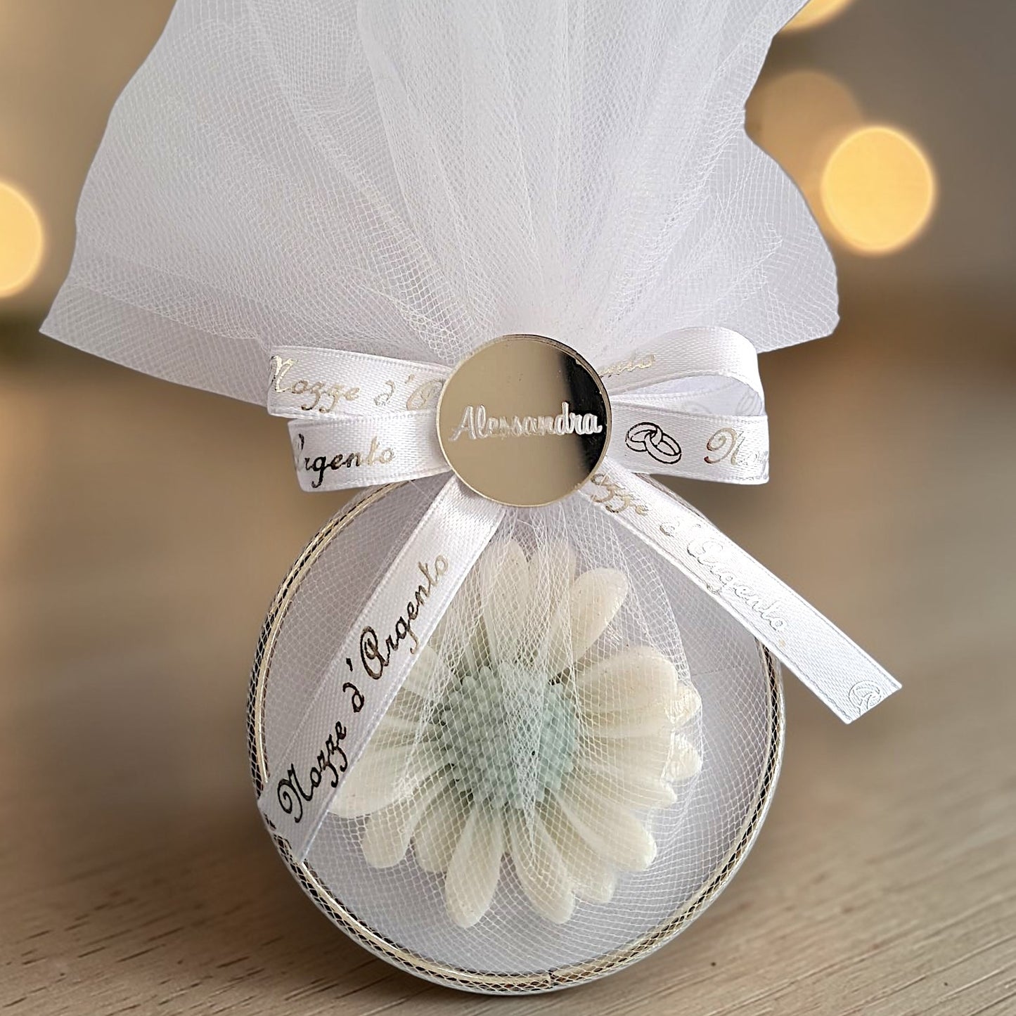 Cerchio metallico con candela a forma di fiore